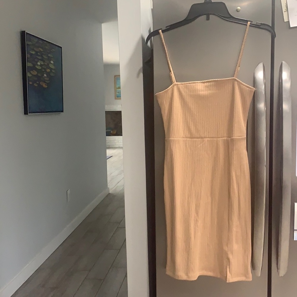 Small Bodycon mini dress. New with tags. Taupe